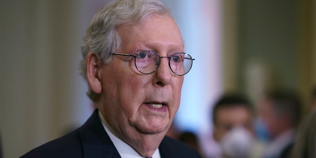 Senate Minority Leader Mitch McConnell, R-Ky., speaks to reporters after a Republican policy meeting at the Capitol in Washington on Oct. 5, 2021.