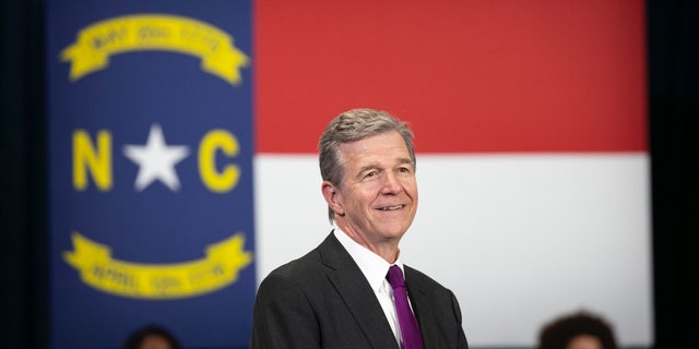 Democratic Gov. Roy Cooper appears before President Biden speaks to guests during a visit to North Carolina Agricultural and Technical State University on April 14, 2022, in Greensboro.