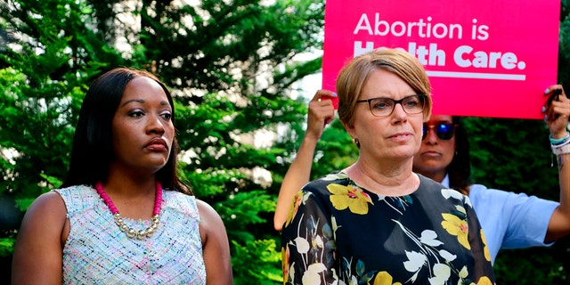 Democratic State Sen. Natalie Murdock, of Durham County, and state Rep. Julie von Haefen, of Wake County, encourage North Carolina voters to support candidates who will preserve abortion access at a news conference in Raleigh on Aug. 18, 2022.