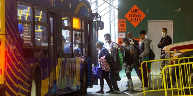 Migrants leave for a shelter from the Port Authority bus terminal in New York, the United States, on Sept. 27, 2022. 