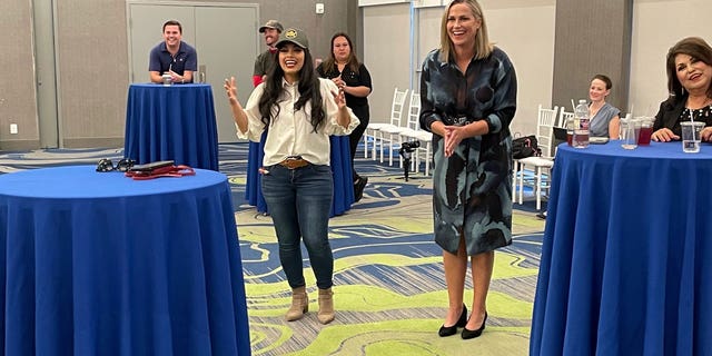 Washington Republican Senate nominee Tiffany Smiley, right, stands alongside Rep. Mayra Flores, R-Texas, during a meeting with border patrol agents and their families in McAllen, Texas on Aug. 30, 2022.