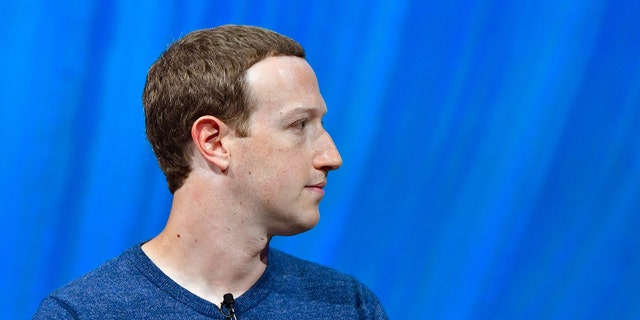 Two state Attorneys General say Facebook CEO Mark Zuckerberg worked with Dr. Fauci to censor online discussions about COVID. (Photo credit should read GERARD JULIEN/AFP via Getty Images)