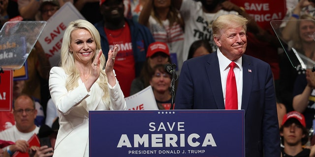 ANCHORAGE, ALASKA - JULY 09: Republican U.S. Senate candidate Kelly Tshibaka and former U.S. President Donald Trump at Alaska Airlines Center on July 09, 2022 in Anchorage, Alaska. 