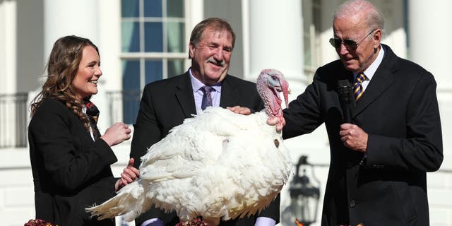 President Biden pardons Chocolate, the National Thanksgiving Turkey, as he is joined by the 2022 National Turkey Federation Chairman Ronnie Parker and Alexa Starnes, daughter of the owner of Circle S Ranch, on the South Lawn of the White House Nov. 21, 2022, in Washington, D.C.
