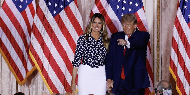 Former US President Donald Trump arrives to speak with former First Lady Melania Trump, left, at the Mar-a-Lago Club in Palm Beach, Florida, US, on Tuesday, Nov. 15, 2022. 