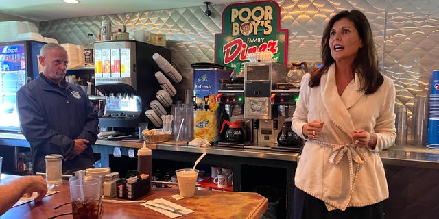 Former South Carolina Gov. Nikki Haley teams up on the campaign trail with GOP Senate nominee Don Bolduc at Poor Boy's Family Diner, on Sept. 23, 2022, in Londonderry, New Hampshire.