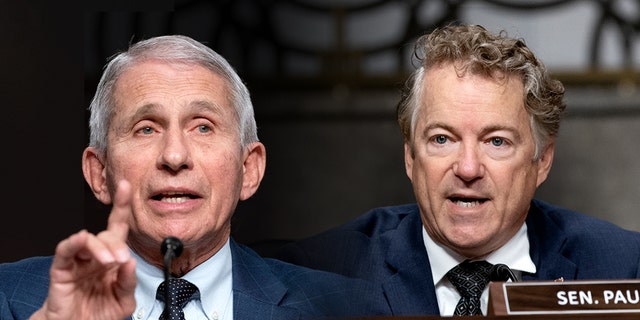 Dr. Anthony Fauci, left, and Sen. Rand Paul, R-Ky.