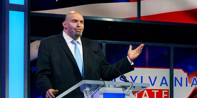 Pennsylvania Democratic Senate candidate John Fetterman participates in a debate with his GOP challenger Dr. Mehmet Oz on Oct. 25, 2022, in Harrisburg, Penn.