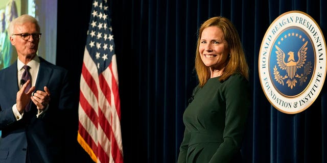 U.S. Supreme Court Associate Justice Amy Coney Barrett smiles after a public conversation with Board of Trustees Chairman Frederick J. Ryan, Jr., at the Ronald Reagan Presidential Library Foundation in Simi Valley, Calif., Monday, April 4, 2022.