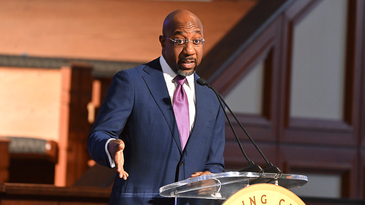 Democratic Georgia Sen. Raphael Warnock, who also serves as the head pastor at Ebenezer Baptist Church in Atlanta, speaks from the pulpit.