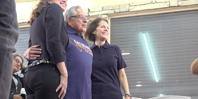 Sen. Catherine Cortez Masto (right) poses for a picture with a voter (middle) and Nevada's Lt. Gov. Lisa Cano Burkhead (left) at a Get Out The Vote Rally on Oct. 22, 2022.