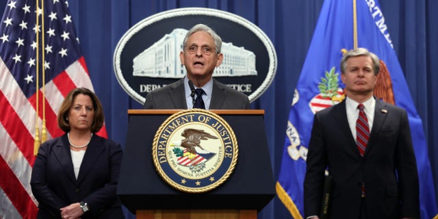 Attorney General Merrick Garland, F.B.I. Director Christopher Wray and Deputy Attorney General Lisa Monaco hold a press conference at the U.S. Department of Justice on Oct. 24, 2022, in Washington, D.C. 