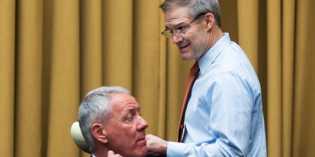 Ranking member Rep. Jim Jordan, R-Ohio, right, and Rep. Ken Buck, R-Colo., are seen during the House Judiciary Committee hearing titled Oversight of the Federal Bureau of Investigation, Cyber Division, in Rayburn Building Tuesday, March 29, 2022. 