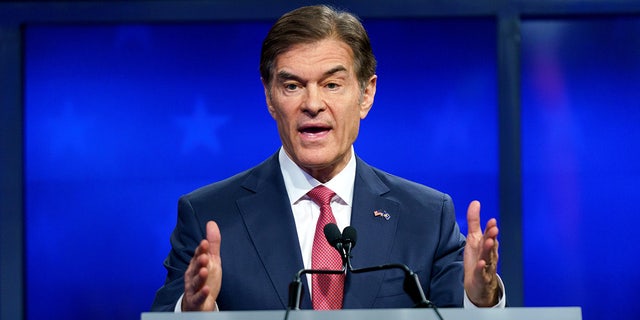 Republican Senate candidate Dr. Mehmet Oz participates in a debate with his Democratic challenger John Fetterman on Oct. 25, 2022, in Harrisburg, Pennsylvania.