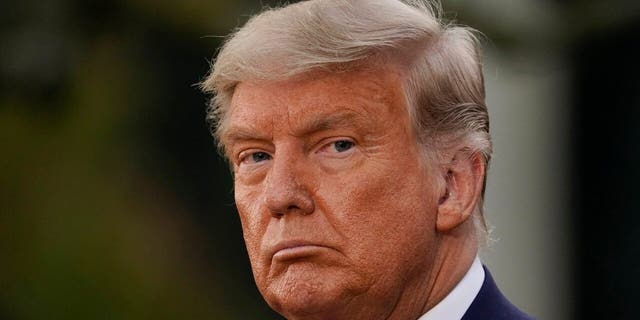 Then-President Donald Trump listens during an event on Operation Warp Speed in the Rose Garden of the White House in Washington on Nov. 13, 2020. 