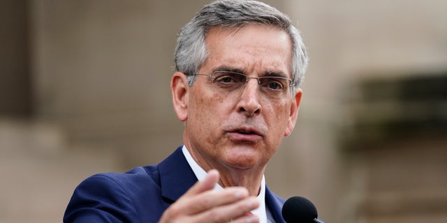 Georgia Secretary of State Brad Raffensperger speaks during a news conference on Wednesday, Nov. 11, 2020, in Atlanta. (AP Photo/Brynn Anderson)