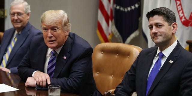 Senate Minority Leader Mitch McConnell, left, former President Donald Trump, center, and former House Majority Leader Paul Ryan