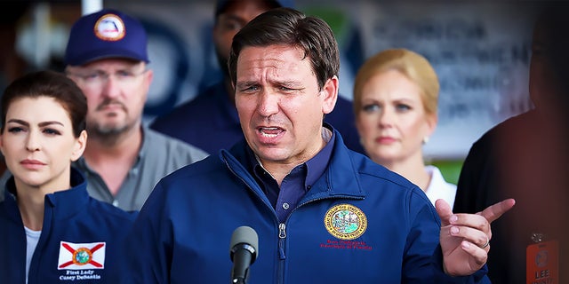 Florida Governor Ron DeSantis speaks during a press conference to update information about the on ongoing efforts to help people after hurricane Ian passed through the area on October 4, 2022, in Cape Coral, Florida.