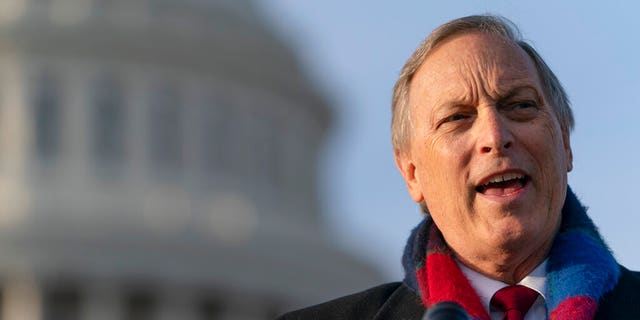 FILE - In this Dec. 3, 2020 file photo Freedom Caucus chairman Rep. Andy Biggs, R-Ariz., speaks on Capitol Hill in Washington. Biggs has been castigated by his two brothers over his efforts to cast doubt about President Joe Biden's victory. The siblings of Republican Rep. Andy Biggs wrote in a letter to his hometown newspaper The Arizona Republic that Biggs is "at least partially to blame" for the violent insurrection at the U.S. (AP Photo/Jacquelyn Martin,File)