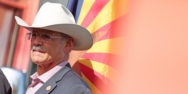 Arizona Republican Secretary of State candidate Mark Finchem looks on during a get-out-the-vote campaign rally on Nov. 5, 2022, in Chandler, Arizona. 