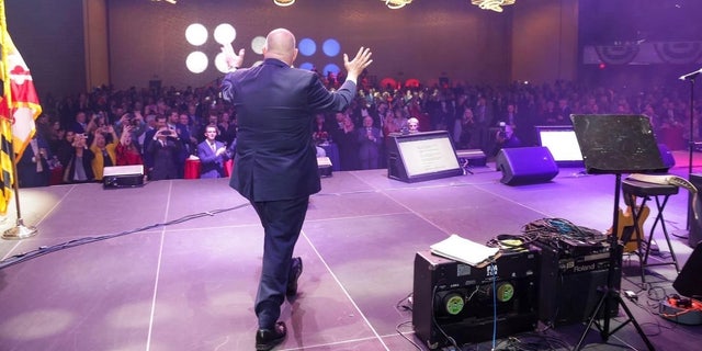 Term-limited Republican Gov. Larry Hogan takes to the stage at a celebration of his eight years steering the blue state of Maryland, at an event in Baltimore on Nov. 30, 2022.