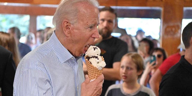 President Joe Biden eats ice cream in Traverse City, Michigan, on July 3, 2021.