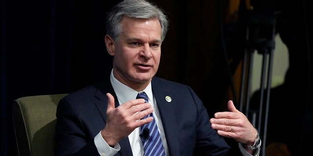 FBI Director Christopher Wray speaks at the Gerald R. Ford School of Public Policy at the University of Michigan, Friday, Dec. 2, 2022, in Ann Arbor, Mich. 