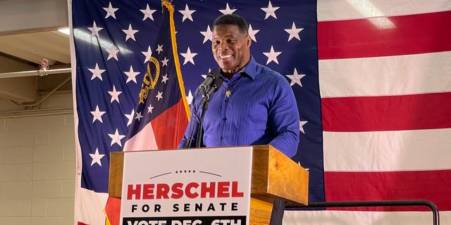 GOP Senate nominee Herschel Walker holds a rally on Nov. 30, 2022 in Dalton, Georgia, ahead of the state's Dec. 6 Senate runoff election.