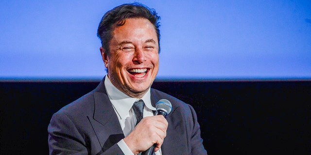 Tesla CEO Elon Musk smiles as he addresses guests at the Offshore Northern Seas 2022 (ONS) meeting in Stavanger, Norway on Aug. 29, 2022. 