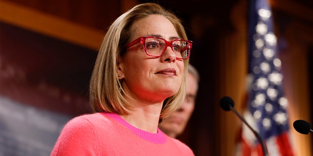 Sen. Kyrsten Sinema, D-Ariz., speaks at a news conference just days before her announcement to defect from the Democratic Party. 