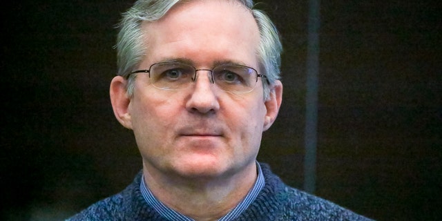 Paul Whelan, a U.S. Marine veteran who was arrested for alleged spying, listens to the verdict in a courtroom in Moscow, Russia, June 15, 2020.