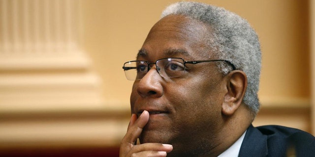 Donald McEachin listens to debate on the floor of the Virginia state Senate in Richmond, Va., Feb. 25, 2015.