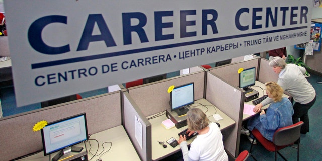 May 17: Job searches use computers to search for jobs at WorkSource Oregon, in Tualatin, Ore.