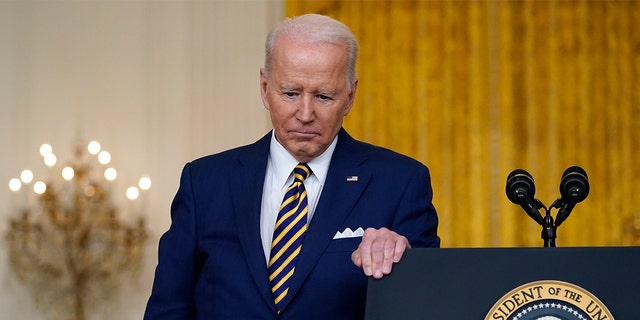 President Biden listens to a question during a news conference in the East Room of the White House, Jan. 19, 2022.