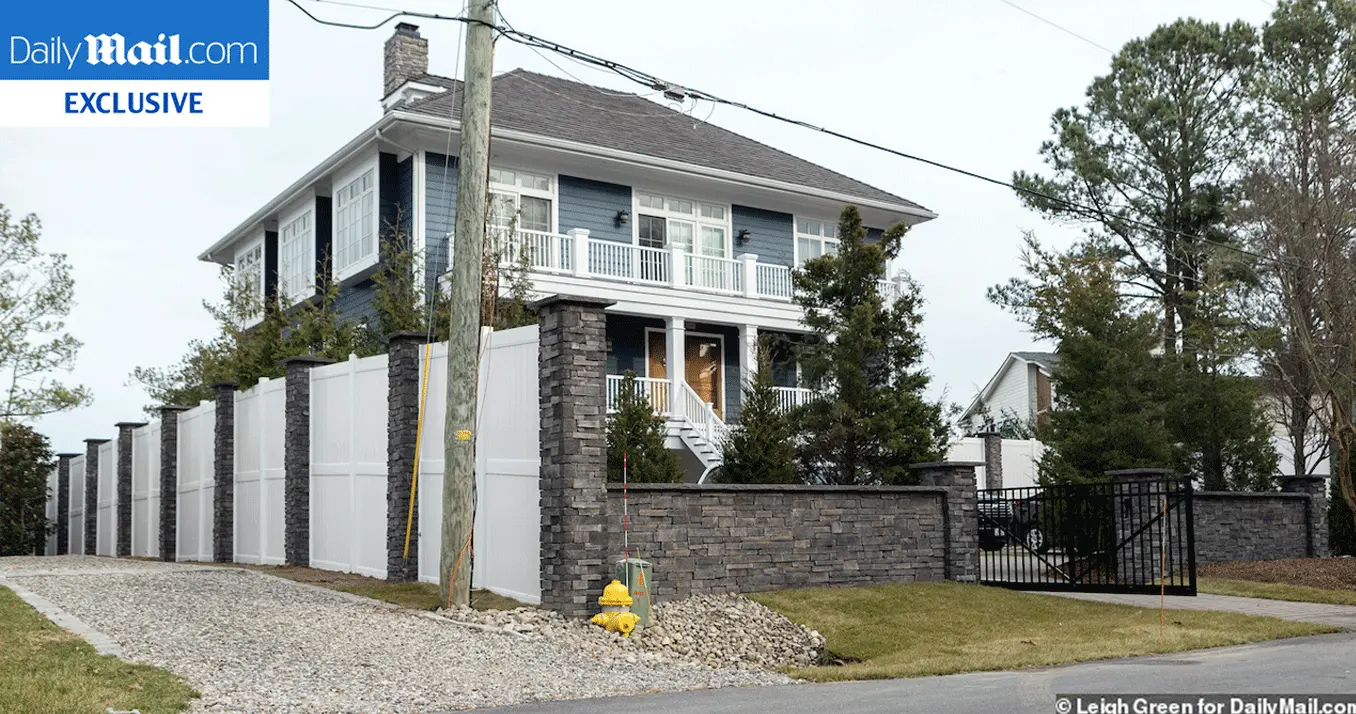 The Biden's build a wall, fences and gates at their Rehobeth Beach vacation home in Delaware.