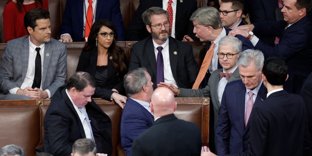 FILE: U.S. Rep.-elect Mike Rogers, R-Ala., is restrained by Rep.-elect Richard Hudson, R-N.C., after getting into an argument with Rep.-elect Matt Gaetz, R-Fla., as House Republican Leader Kevin McCarthy, R-Calif., walks away, in the House Chamber during the fourth day of elections for Speaker of the House at the U.S. Capitol Building on January 06, 2023 in Washington, DC.