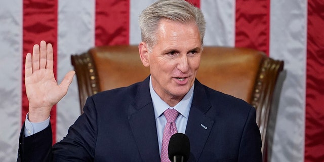 Dean of the House Rep. Hal Rogers, R-Ky., swears in Rep. Kevin McCarthy, R-Calif., as House Speaker on the House floor at the U.S. Capitol in Washington, early Saturday, Jan. 7, 2023. 