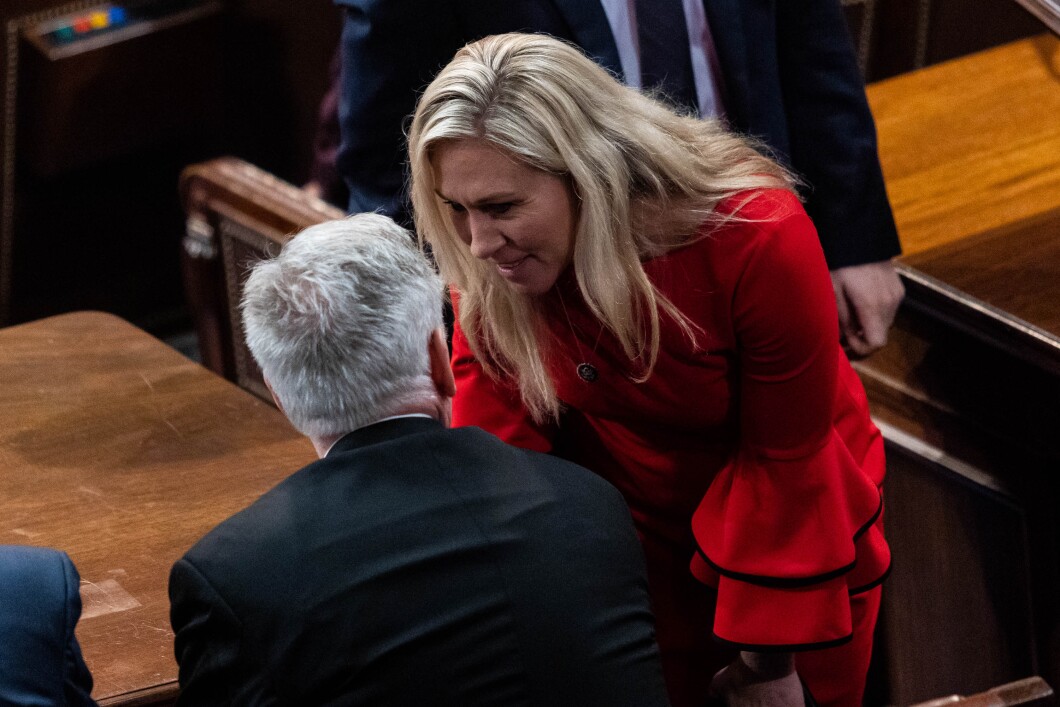 Marjorie Taylor Greene of Georgia speaks with Republican Leader Kevin McCarthy on the House floor Wednesday, Jan. 4, 2023, at the U.S. Capitol in Washington DC. 