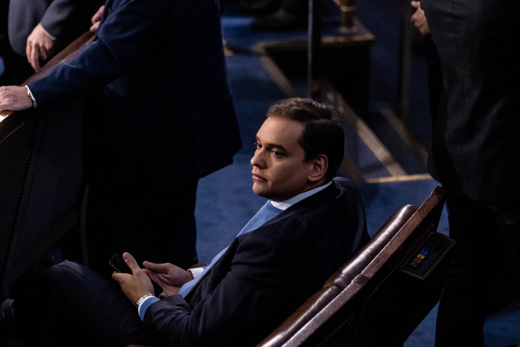 Rep.-elect George Santos sits alone during a meeting of the 118th Congress in the House Chamber at the U.S. Capitol in Washington, DC, on Thursday, Jan. 3, 2023.