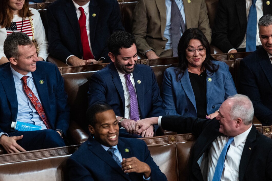 Rep.-elect Michael Lawler of Florida fist bumps with Rep.-elect Steve Scalise on Thursday, Jan. 5, 2023, during the third day of elections for speaker of the House.