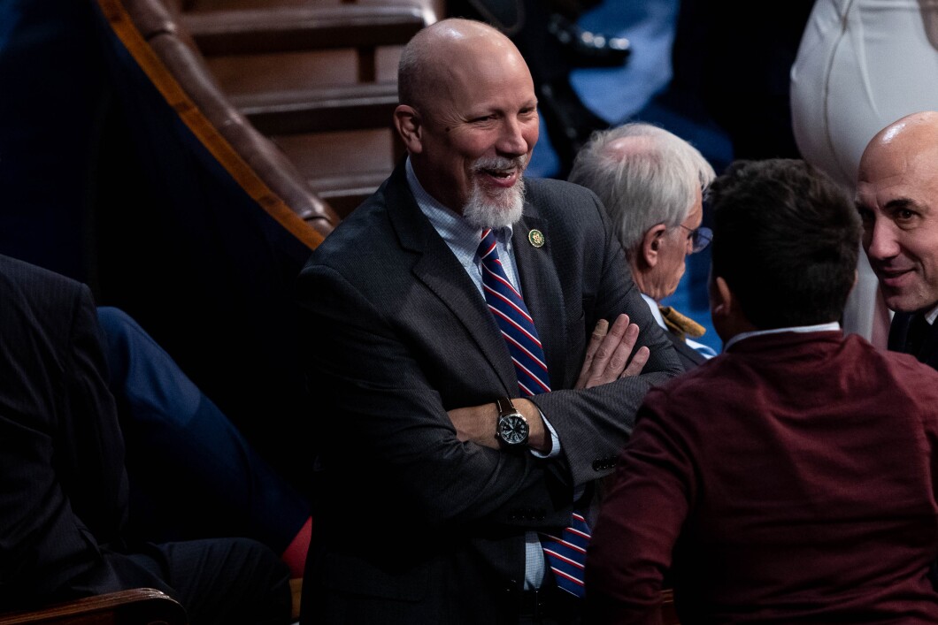 Rep.-elect Chip Roy of Texas talks with colleagues on the House floor, following another round of voting for a new House speaker on the first day of the 118th Congress, Tuesday, January 3, 2023. 