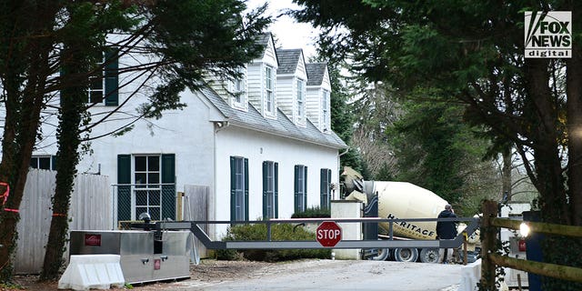 A view of the gate and access road leading to President Joe Biden's home in Wilmington, Delaware, on Jan. 12. 2023.