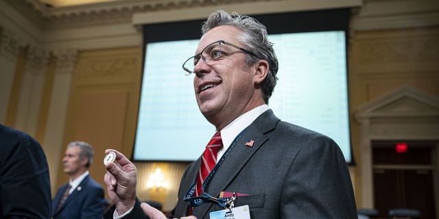 Rep.-elect Andy Ogles, a Republican from Tennessee, holds the No. 1 pick coin during the biennial office lottery on Capitol Hill in Washington, D.C., on Dec. 2, 2022.