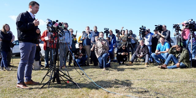 Secretary of Transportation Pete Buttigieg speaks during a news conference Thursday, Feb. 23, 2023, near the site of the Feb. 3 Norfolk Southern train derailment in East Palestine, Ohio. (AP Photo/Matt Freed)