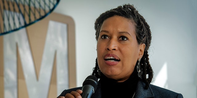 Mayor Muriel Bowser makes remarks as she and other dignitaries celebrate the opening of the new Metro headquarters building, in Washington, DC. 