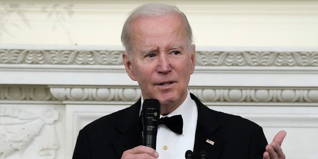 President Biden speaks during a dinner reception for governors and their spouses in the State Dining Room of the White House, Saturday, Feb. 11, 2023, in Washington. 