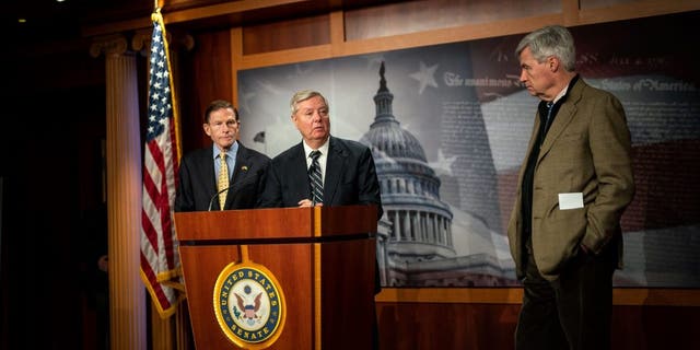 Sens. Richard Blumenthal, D-Conn., Lindsey Graham, R-S.C., and Sen. Sheldon Whitehouse, D-R.I., introduce their legislation to designate The Wagner Group an international terrorist organization at the U.S. Capitol on Thursday, Feb. 16, 2023.