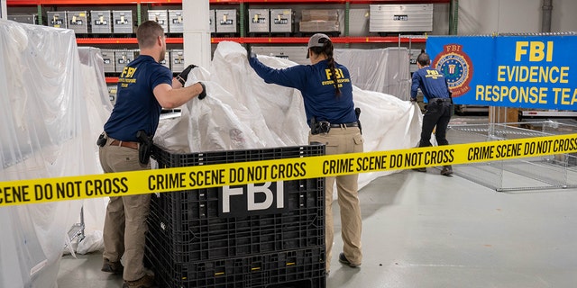 FBI Special Agents assigned to the Evidence Response Team process material recovered from the High Altitude Balloon recovered off the coast of South Carolina.  The material was processed and transported to the FBI Laboratory in Quantico, VA. (FBI)