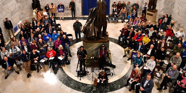 Members of the Faith and Family advocacy group, a pro life organization, hold a rally in the rotunda of the Kentucky State Capitol in Frankfort, Ky., Thursday, Feb. 16, 2023.