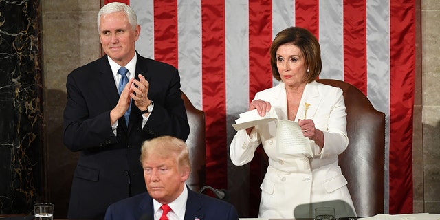 Then-House Speaker Nancy Pelosi ripped up President Trump's final State of the Union speech in 2020, a stunt House Speaker Kevin McCarthy says he will not repeat tonight. (Photo by MANDEL NGAN / AFP) (Photo by MANDEL NGAN/AFP via Getty Images)